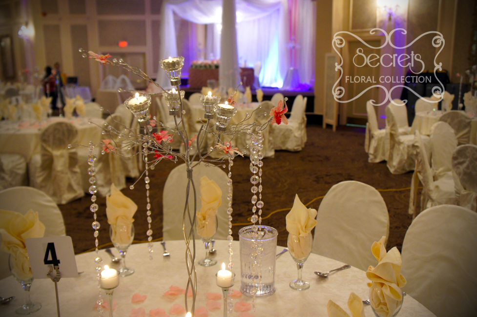 Guest Table Setup with Ivory Tablecloth and Chair Covers Secrets